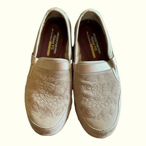 Skechers embroidered slip ons